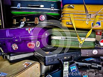 Many of retro vintage old baggages and luggages stacked together Stock Photo