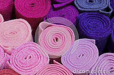 many rolls of felt textile for sale at fabric store Stock Photo