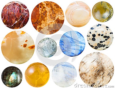 Many round cabochon gem stones isolated on white Stock Photo