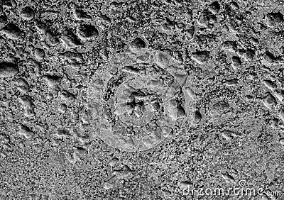 Rugged holes on the rusty color concrete floor Stock Photo