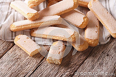 Many Savoiardi cookies closeup on a table. horizontal Stock Photo