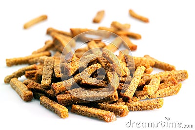 Many small salty dried rusks isolated on white Stock Photo