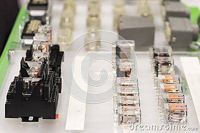 Many socket and electrical relay switch automatic or electromagnet for operated electric circuit of machine or industrial Stock Photo