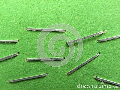 Many staples on paper Stock Photo