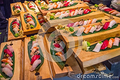 Many sushi dishes for catering Stock Photo