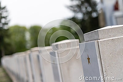 Many tombs in rows, graves on military cemetery Stock Photo