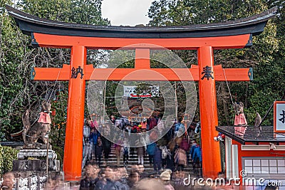 Tourist come to visit famous Fushimi Inari Taisha in Kyoto, Japan Stock Photo