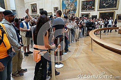 Many Tourists at the Louvre Museum Editorial Stock Photo