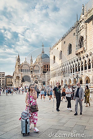 Many tourists visiting Piazzetta San Marco and Colonna di San Marco in Venice Editorial Stock Photo