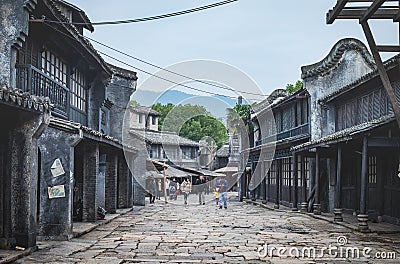 Many traveler at The Hengdianâ€™s world studio for shooting film studio, The traditional ancient village Chinese screen in the Editorial Stock Photo