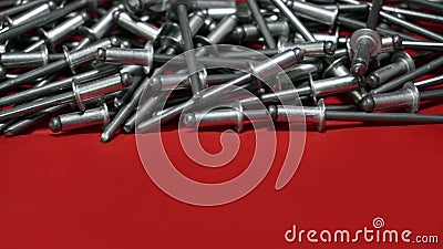 Bunch of rivets background, top half Stock Photo