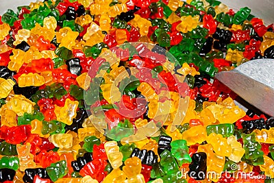 Many varied colorful candies for sale at the market. Kids and children sweet dessert mix treats Editorial Stock Photo