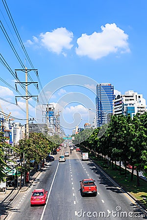 Many vehicles move along Thanon Ratchadaphisek near Esplanade Ratchadapisek Shopping mall Editorial Stock Photo