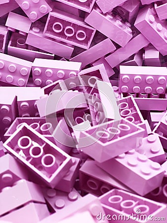 Many Violet plastic Lego blocks. Violet bricks. Stock Photo