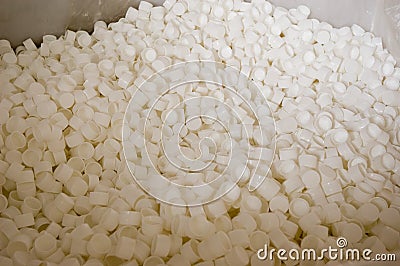 Many white caps for polycarbonate bottles Stock Photo