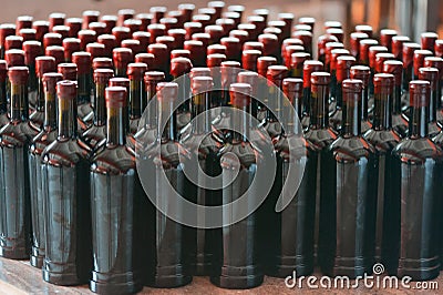 Many wine bottles arranged neatly Stock Photo