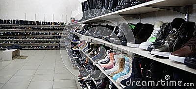 Many women`s, men`s and children`s shoes Stock Photo