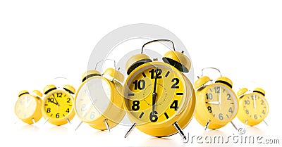 Many yellow alarm clock on white background. Stream of time concept Stock Photo