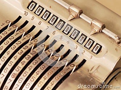 Many Zeros in the display of an old mechanical calculator Stock Photo
