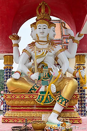 Manyfaced statues in the temple Wat Plai Laem. Editorial Stock Photo