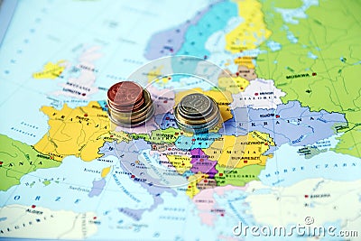 Map of Europe with Euro coins and Polish zloty Editorial Stock Photo