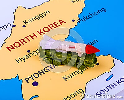 Map of North Korea with a military machine Stock Photo