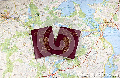 Map and two passports ready to be used. Color photo. Stock Photo