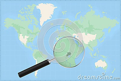 Map of the world with a magnifying glass on a map of Uganda Vector Illustration