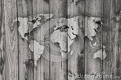 Map of the world on weathered wood Stock Photo