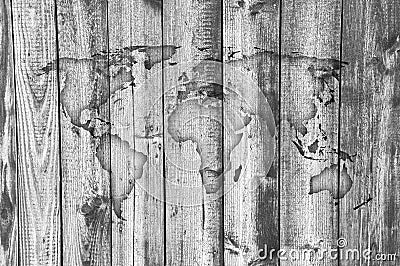 Map of the world on weathered wood Stock Photo