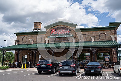 Exterior of a Portillos Hot Dog restaurant, known for their famous Chicago dogs Editorial Stock Photo