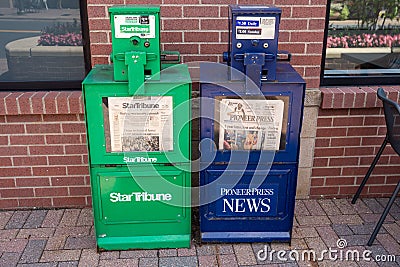 Newspaper vending machine kiosks for the StarTribune and St Paul Pioneer Press, the two Editorial Stock Photo