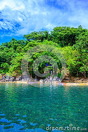 Maquinit Hot Spring at Busuanga island near Coron town, tropical swimming pools, Palawan, Philippines Stock Photo