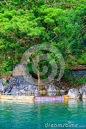 Maquinit Hot Spring at Busuanga island near Coron town, tropical swimming pools, Palawan, Philippines Stock Photo
