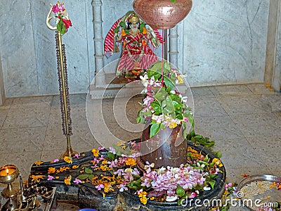 Flowers offering on shivling Hinglaj village Editorial Stock Photo