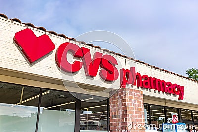 Mar 24, 2020 Sunnyvale / CA / USA - Close up of CVS / pharmacy logo above the entrance at one of their locations in San Francisco Editorial Stock Photo