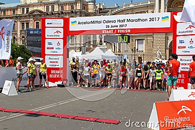 Marathon with children. Kid runners at starting line at summer maraton Editorial Stock Photo