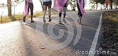 Marathon run for cancer, pink ribbon charity Stock Photo