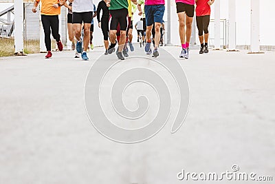 Marathon runners People Race to finish line Outdoor sport training exercise Stock Photo