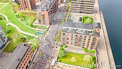 Marathon running race, aerial view of start and finish line with many runners from above, road racing, sport competition Stock Photo