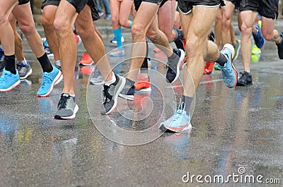 Marathon running race, many runners feet on road racing, sport competition, fitness and healthy lifestyle Stock Photo