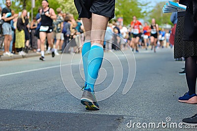 Marathon running race, many runners feet on road racing, sport competition, fitness healthy lifestyle concept Editorial Stock Photo