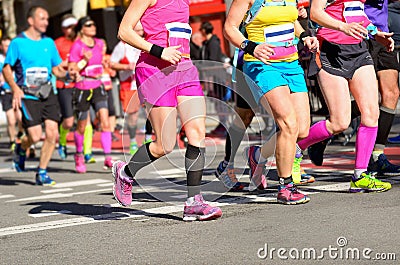 Marathon running race, women runners feet on road Editorial Stock Photo