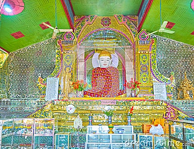 The marble Buddha in the shrine in Su Taung Pyae Pagoda, Mandala Editorial Stock Photo