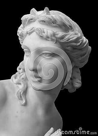 Marble head sculpture of young woman, ancient Greek goddess art bust statue isolated on black background Stock Photo