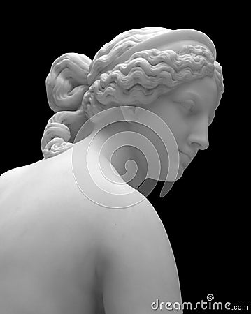 Marble head sculpture of young woman, ancient Greek goddess art bust statue isolated on black background Stock Photo