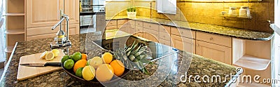 Marble island inside expensive kitchen Stock Photo