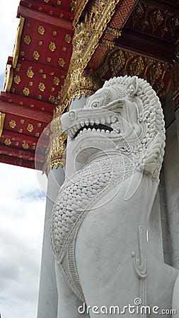 Marble Lion guarding the Marble Temple in Bangkok Thailand Stock Photo