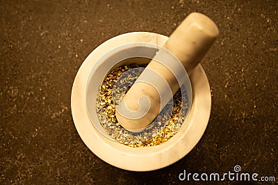Marble mortar and medicine herbs close up Stock Photo