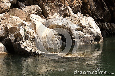 Marble Rocks amid River Water Stock Photo